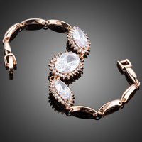 Close up detail of KHAISTA white CZ link chain bracelet