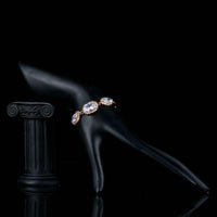 Side angle view of KHAISTA white CZ link chain bracelet
