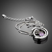 Side angle view of KHAISTA white gold crystal chain necklace