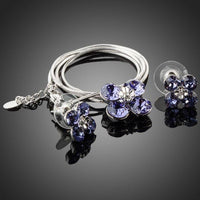 Side angle view of KHAISTA purple floral set