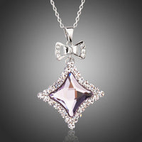 KHAISTA white gold bow knot long chain necklace on white background