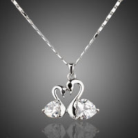 KHAISTA white gold crystal goose necklace on white background