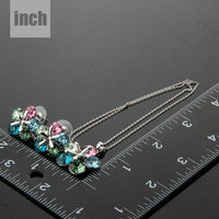 Floral detail on Khaista white gold Stellux set