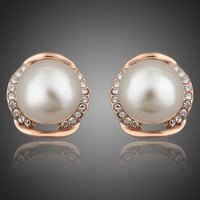 KHAISTA white pearl dome stud earrings on white background