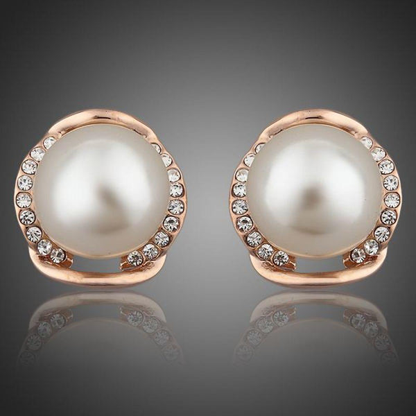 KHAISTA white pearl dome stud earrings on white background