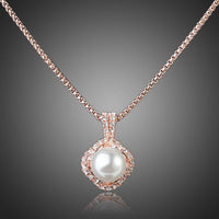 KHAISTA white pearl pendant necklace on white background