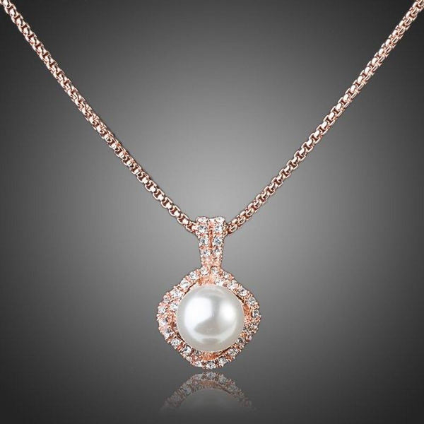 KHAISTA white pearl pendant necklace on white background