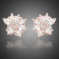 KHAISTA white rose CZ stud earrings on white background