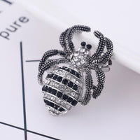 Close-up of crystals on Khaista spider brooch