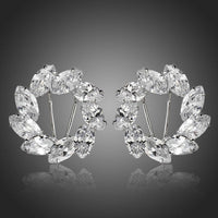 Side angle view of KHAISTA wreath design crystal stud earrings