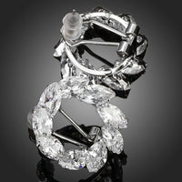 KHAISTA wreath design crystal stud earrings on white background