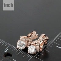 X charm crystal stud earrings detail view by KHAISTA